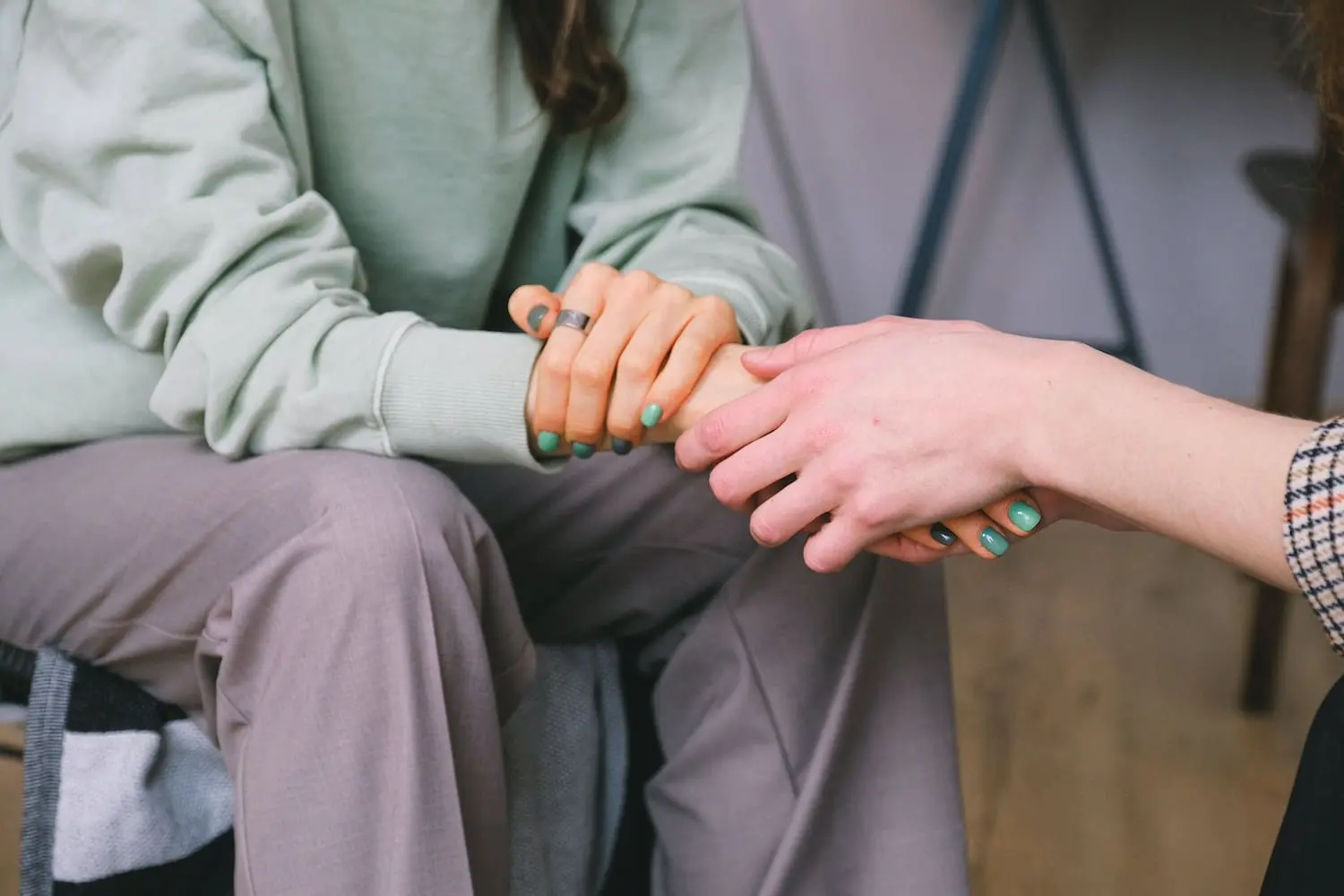 Irritated schoolgirl talking to psychoanalyst about negative feelings, advice