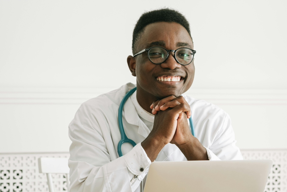 African female school psychologist supporting sad teenage girl during her difficult situation at school
